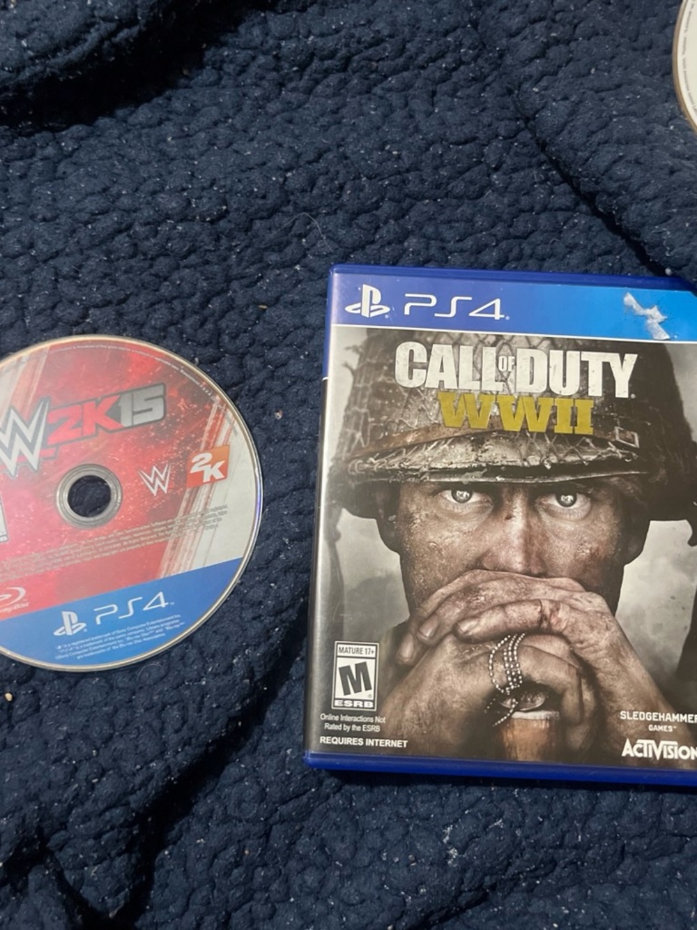 Call of Duty: WWII PS4 Game - Black Case and wwe 2k15 ps4 game
